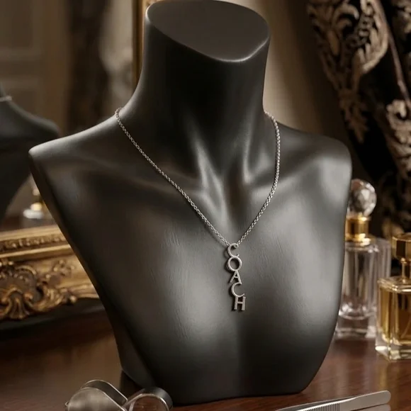 Coa ch Silver-Tone Vertical Logo Pendant Necklace - Picture 3 of 7